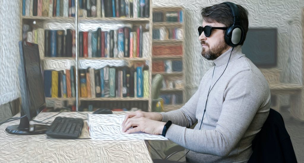 blind man using a computer and ADA compliant websites